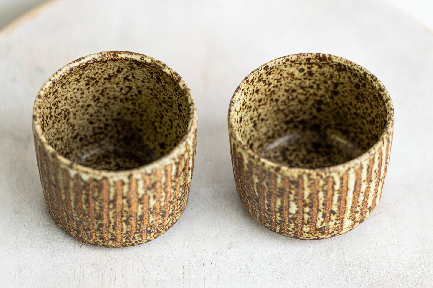 beige freckled glory stoneware vessel