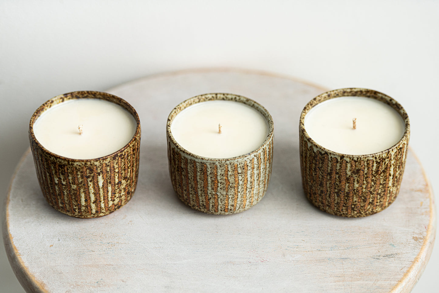 beige freckled glory stoneware candle