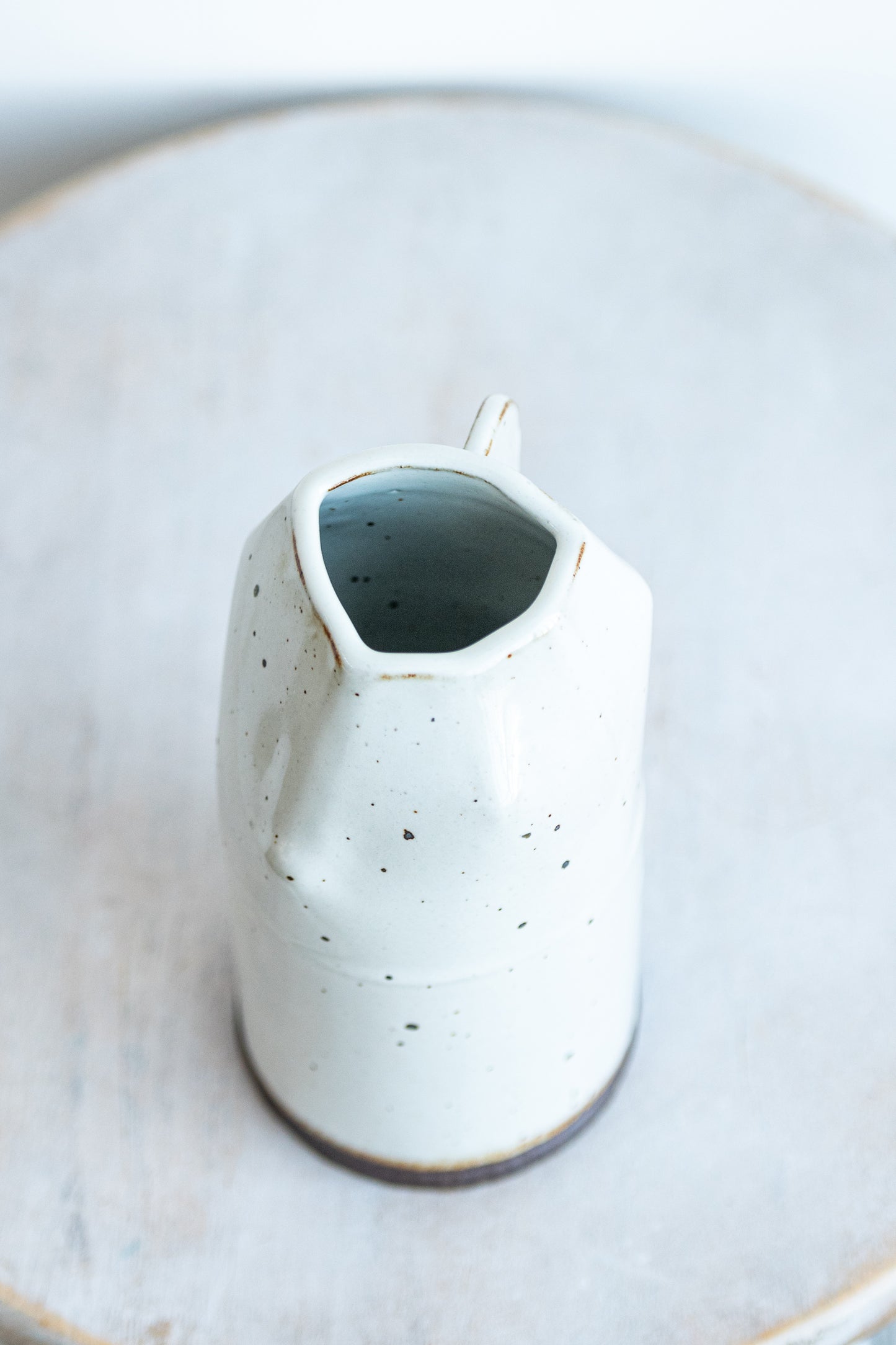 underdog small white stoneware dino vase