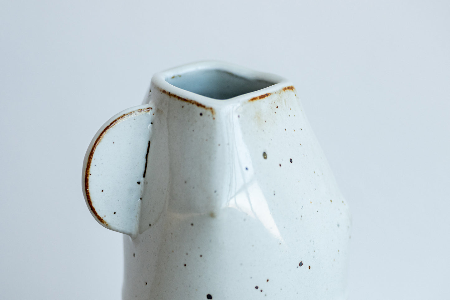 underdog small white stoneware dino vase