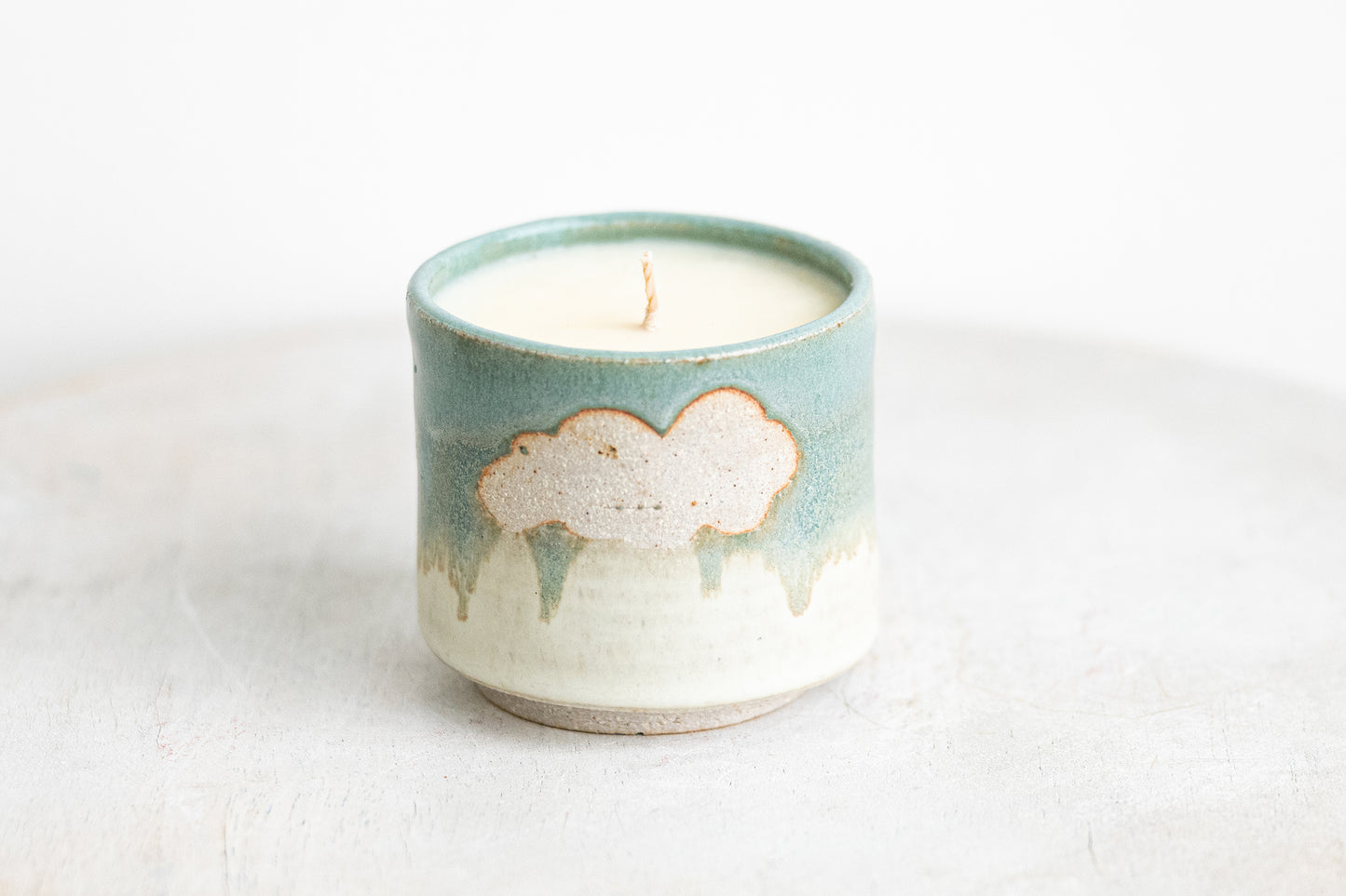cloudy sky underdog stoneware candle