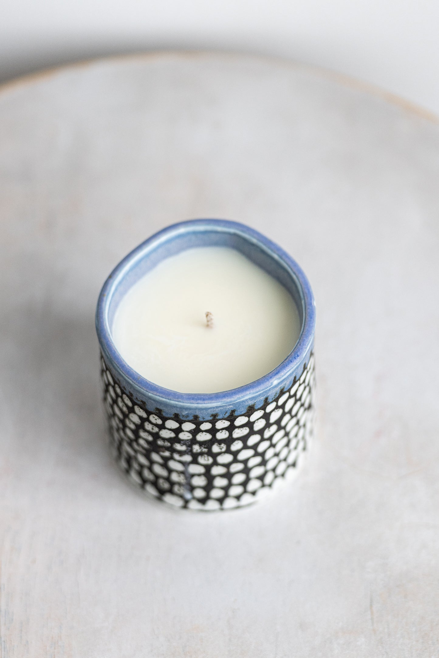 black, white & purple underdog porcelain candle