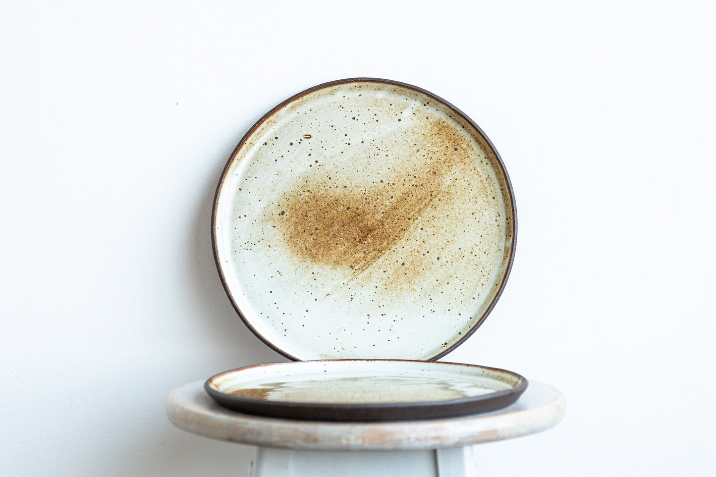 pair of underdog stoneware dinner plates