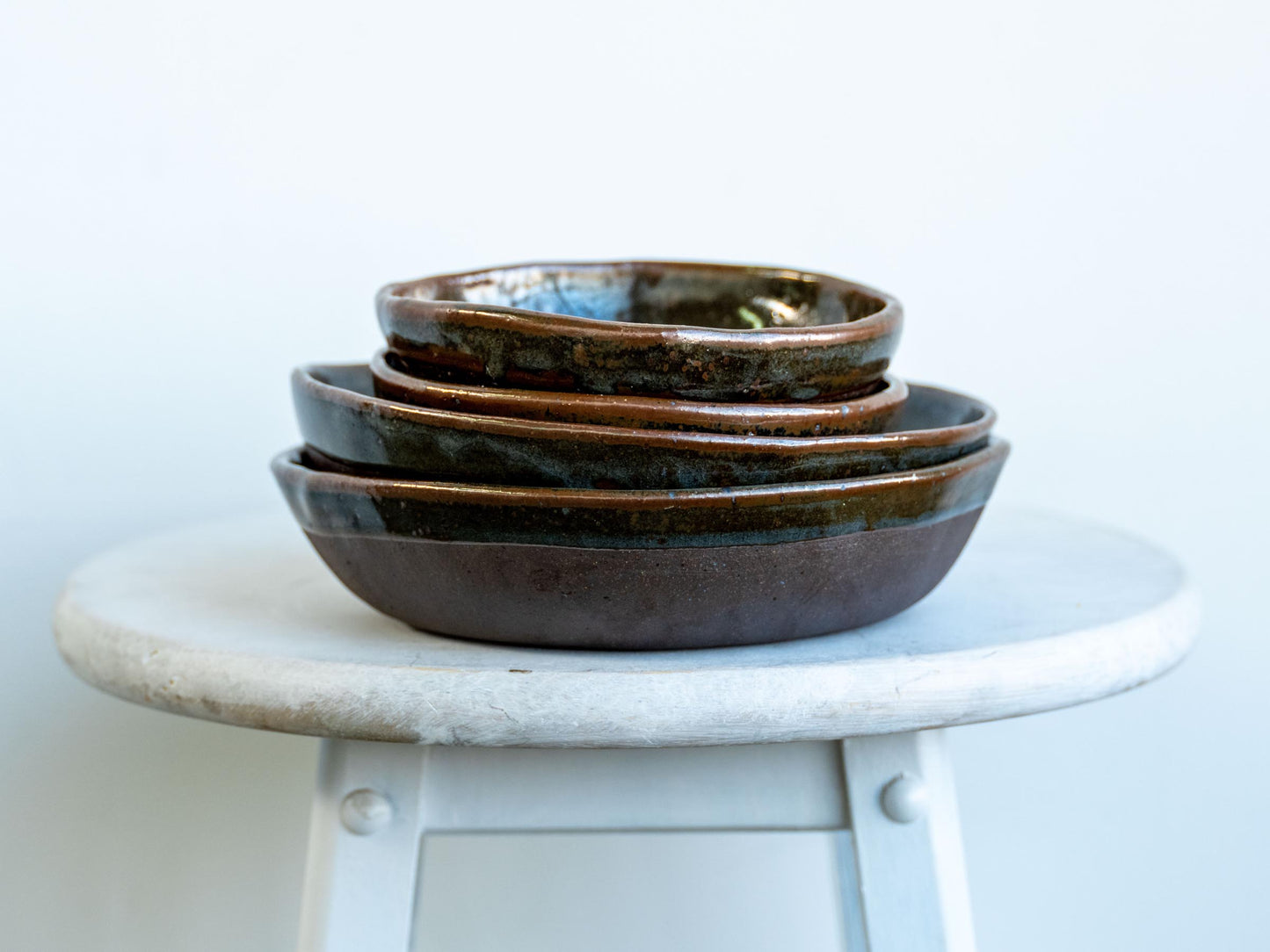 pairs of underdog stoneware celadon bowls