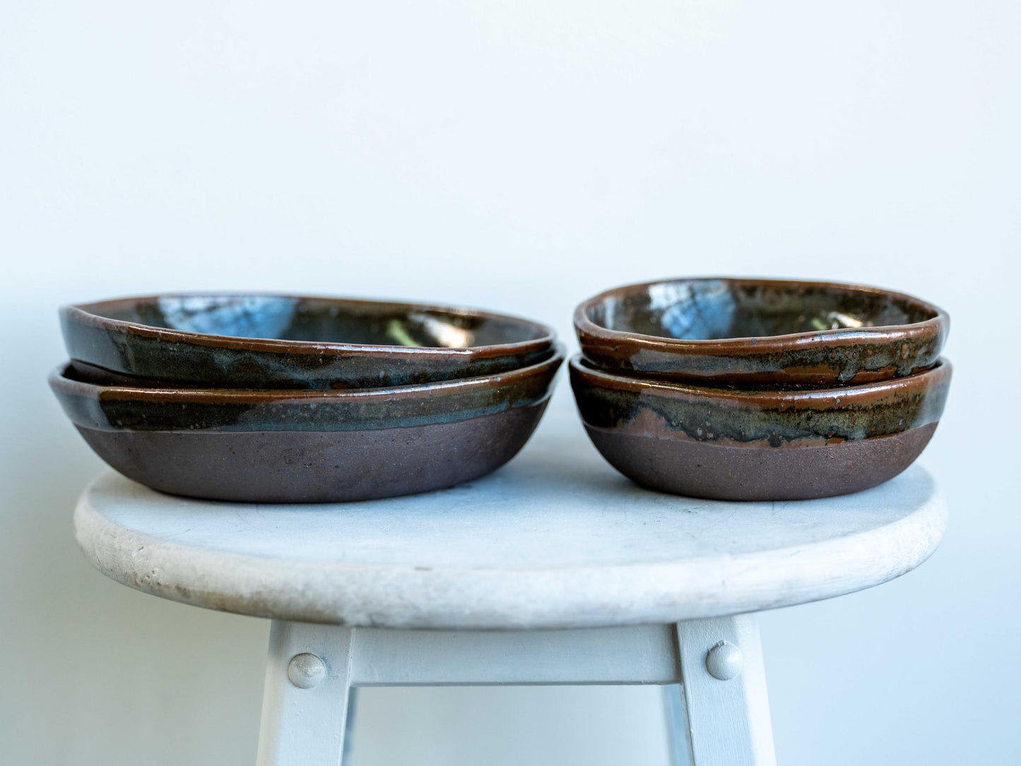 pairs of underdog stoneware celadon bowls