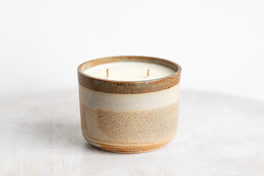 beige lined underdog stoneware candle