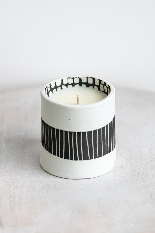 black striped exterior with white blocked interior underdog porcelain candle