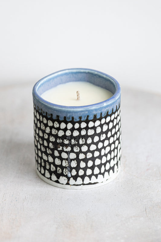 black, white & purple underdog porcelain candle
